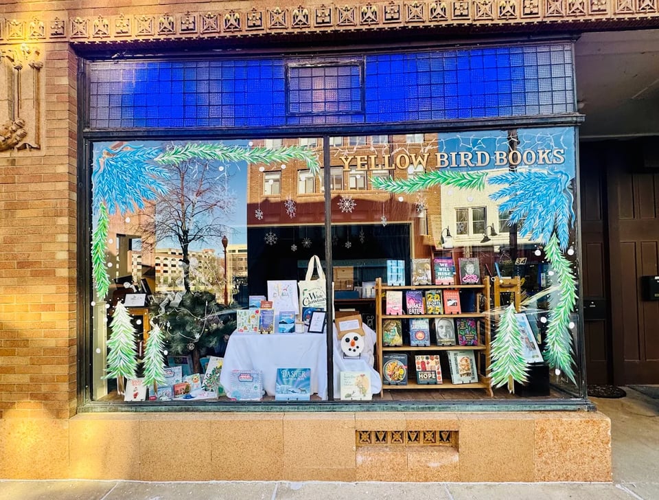 storefront of yellow bird books